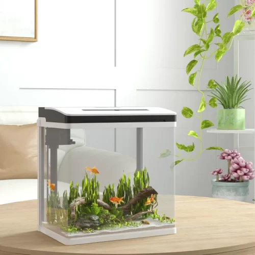 Aquário branco com luz LED e peixes-dourados sobre uma mesa redonda