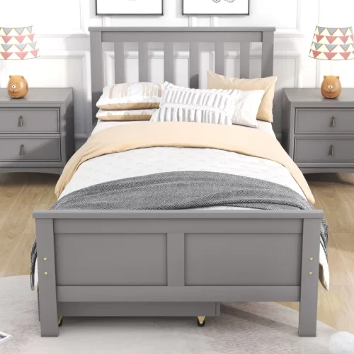 Cama individual cinzenta num quarto infantil pequeno