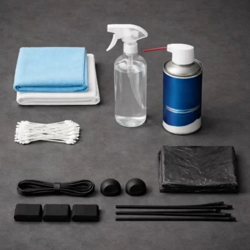Kit com panos, ar comprimido e produtos de limpeza.